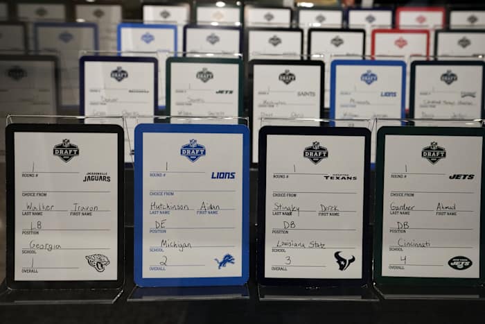 The NFL draft has used a reverse-order method to select players since 1936. Is it time for it to change to a lottery?